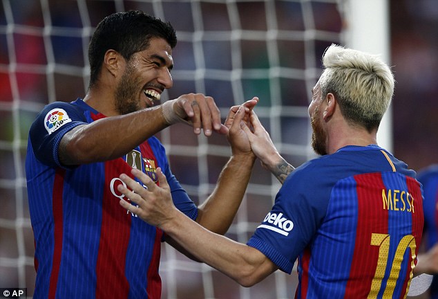 Luis Suarez (left) and Lionel Messi celebrate during Barcelona's win over Sampdoria on Wednesday.