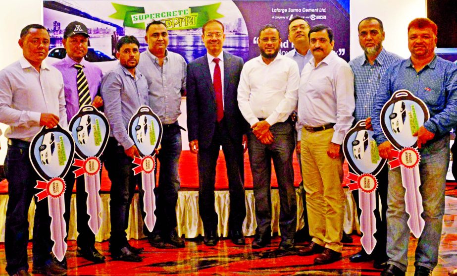 Lafarge Surma Cement Limited recently organized a grand ceremony at a city hotel to hand over prizes among its 'Supercrete Super Offer' winners. Masud Khan, Chief Financial Officer, Navin Malhotra, Sales Director, Syed Naimul Abedin, Head of Brand & Inn