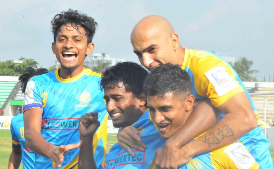 Players of Chittagong Abahani Limited celebrating their 6-1 victory against Uttar Baridhara Club in the match of the JB Group BPL Football at the Rafique Uddin Bhuiyan Stadium in Mymensingh on Sunday.