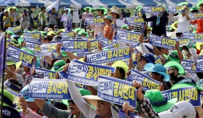 Seongju residents chant slogans during a protest against the government's decision to place a U.S. Terminal High Altitude Area Defence (THAAD) anti-missile defence unit in their town, in Seongju, South Korea.