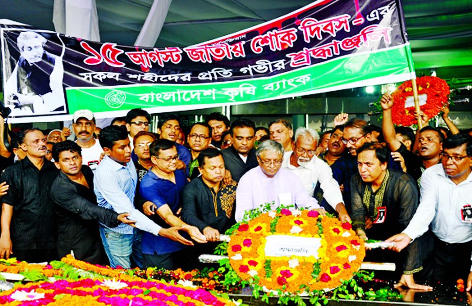 M A Yousoof, Managing Director of Bangladesh Krishi Bank paying homage to Bangabandhu Sheikh Mujibur Rahman at Dhanmondi 32 on Monday marking 41st martyrdom anniversary of Father of the Nation. Deputy Managing Director Mostafa Jalal Uddin Ahmed and Md. Ab