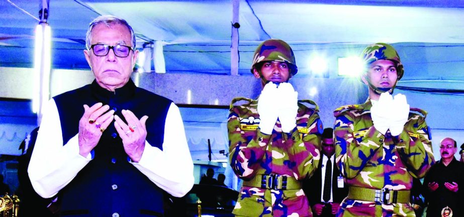 President Abdul Hamid and Prime Minister Sheikh Hasina offering Munajat after placing floral wreaths on the portrait of the Father of the Nation Bangabandhu Sheikh Mujibur Rahman at Bangabandhu Bhaban marking the National Mourning Day on Monday.