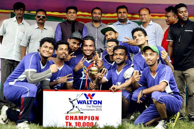 Narail District Sports Association, the champions of the 1st Walton Cup Baseball Competition and the guests and the officials of Bangladesh Baseball-Softball Association pose for a photo session at the Paltan Maidan on Wednesday.