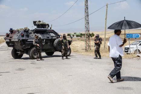Turkish soldiers guard a check point in the troubled southeast of the country.