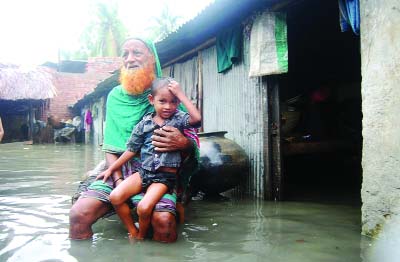 KHULNA: Some villages in Khula have been inundated as dyke has been collapsed. This picture was taken from Horiorpur in Koyra Upazila yesterday.