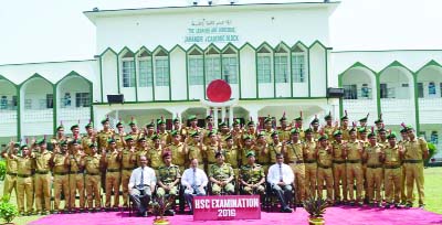 JHENAIDAH: Students of Jhenaidah Cadet College along with the principal showing V-sign after achieving GAP-5 in HSC examination yesterday.