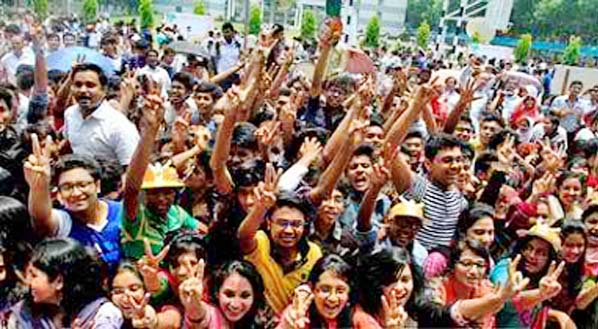 Studentsrejoicing in front of Chittagong Govt College after announcement of HSC results.