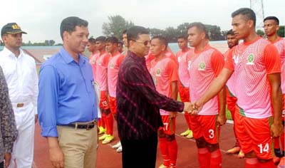 Commandor of BAF Base Bashar Air Vice Marshal Mohammad Abul Bashar being introduced with the players of the inaugural match of the Inter-Service Football Competition at the Dhaka Army Stadium on Thursday.