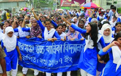 KISHOREGANJ: Students of Kishoreganj Girls' High School brought out a procession in the town yesterday protesting assaulting of their Headmaster and teachers.