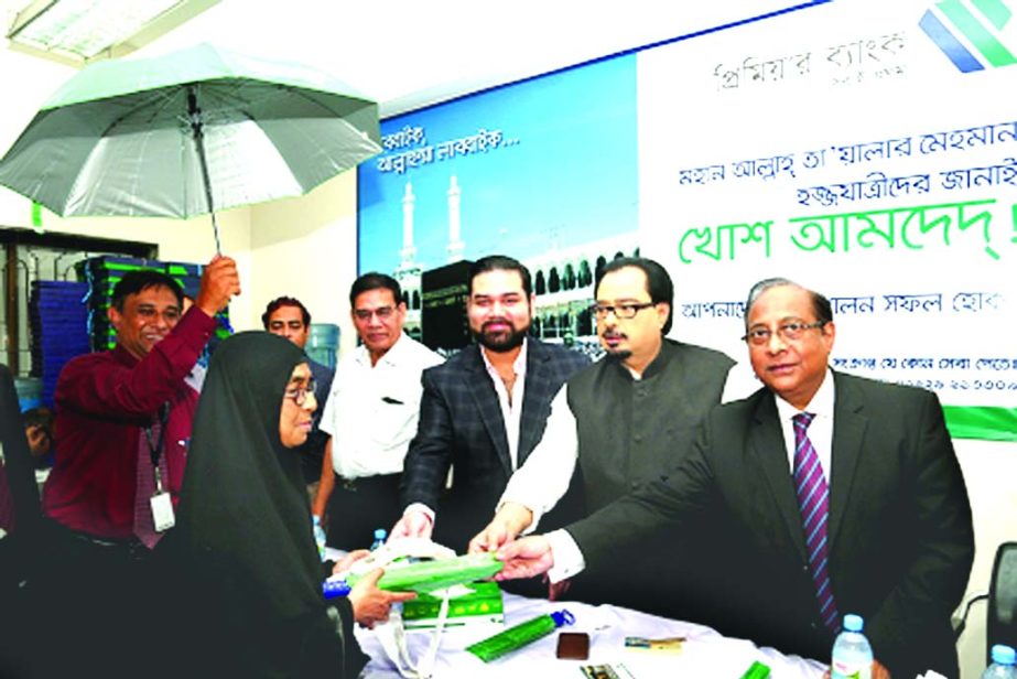Premier Bank Ltd has distributed gift-items among the Hajj pilgrims at Premier Bank's booth at Ashkona Hajj Camp in the city recently. Mohammad Imran Iqbal, Vice Chairman of Premier Bank and B H Haroon, MP, Director, PBL and President of Bangladesh-Saudi