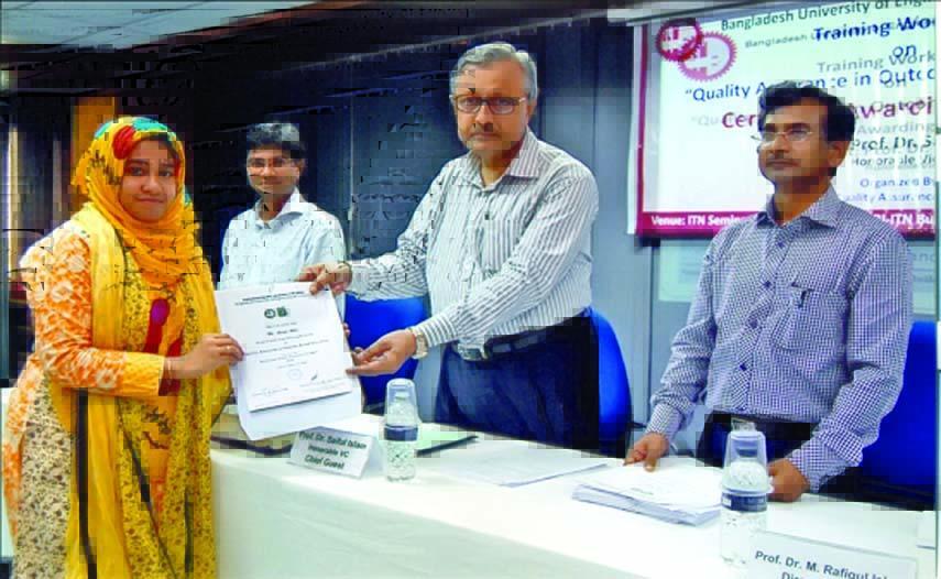 Prof. Dr. Saiful Islam, Vice-Chancellor, BUET handing over certificates among the participants of a day-long training workshop on 'Quality Assurance in Outcome Based Education' organized by Institutional Quality Assurance Cell (IQAC), BUET on Thursday a