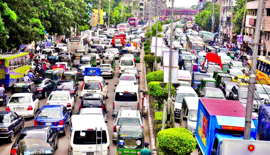 The city experienced huge traffic gridlock following a devastating fire originated at the Bashundhara City Shopping Mall and a programme marking the August 21 grenade attack tragedy on Sunday. This photo was taken from city's Karwan Bazar area.