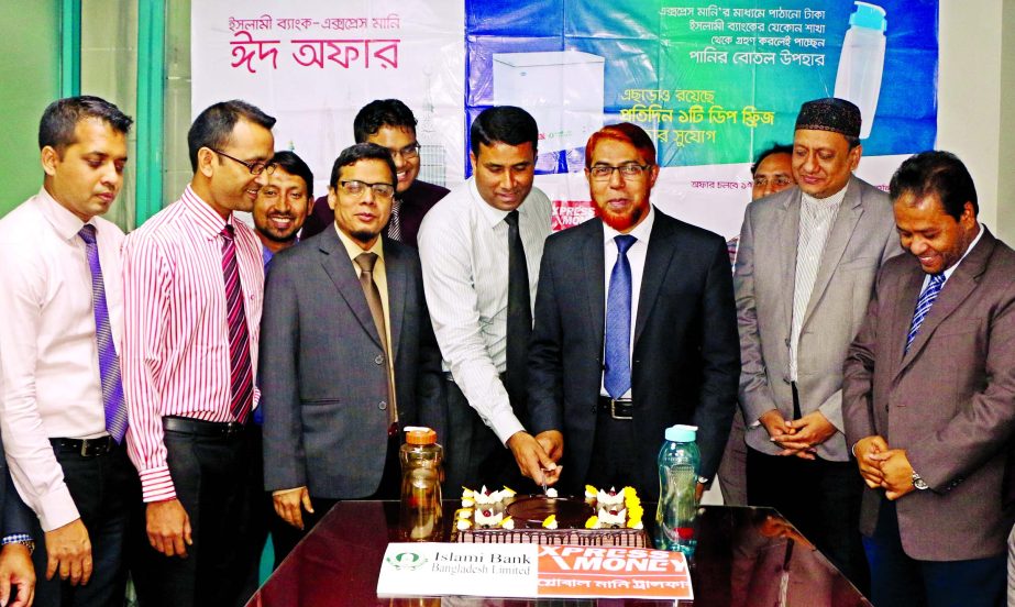 Abdus Sadeq Bhuiyan, Deputy Managing Director of Islami Bank Bangladesh Ltd and Zakaria Mahmud, Country Relationship Manager of Xpress Money, inaugurating Eid special remittance offer at IBBL head office recently.