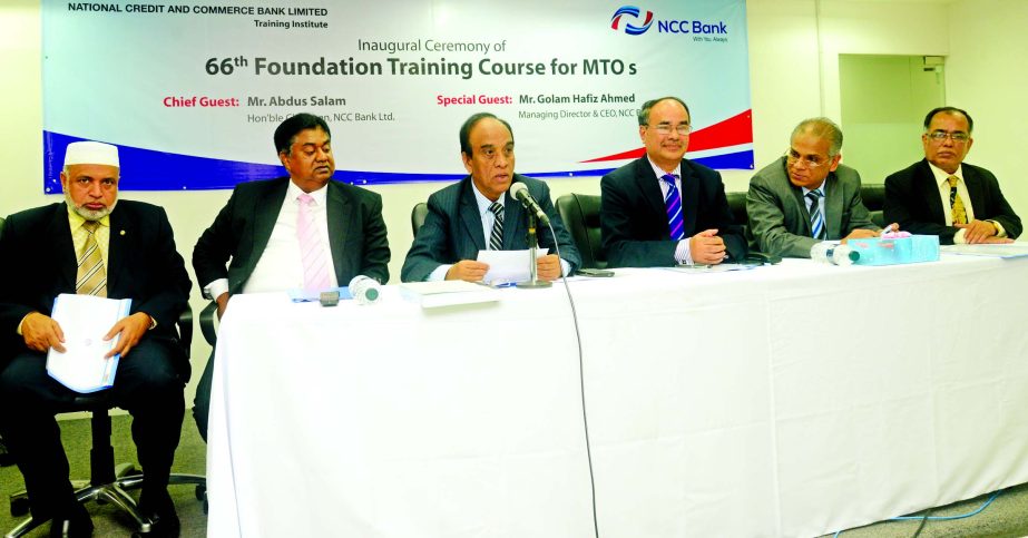 Abdus Salam, Chairman of NCC Bank, addressing the opening ceremony of its month long Foundation Training Course recently at the bank's office. Managing Director Golam Hafiz Ahmed and Additional Managing Director Mosleh Uddin Ahmed of the bank attended.