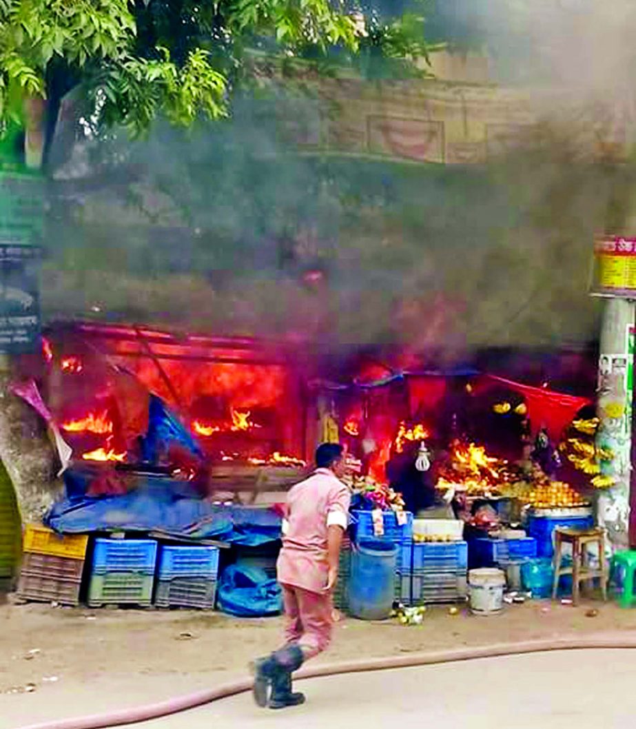 A devastating fire broke out at a market adjacent to Railgate in Gaibandha Sadar Upazila burning about 20 shops on Monday.