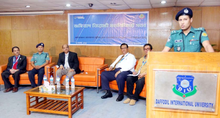 Biplab Kumar Sarker, Deputy Commissioner, Dhaka Metropolitan Police (Tejgaon Division) addressing a view exchange programme on anti-militancy at Daffodil International University on Tuesday.