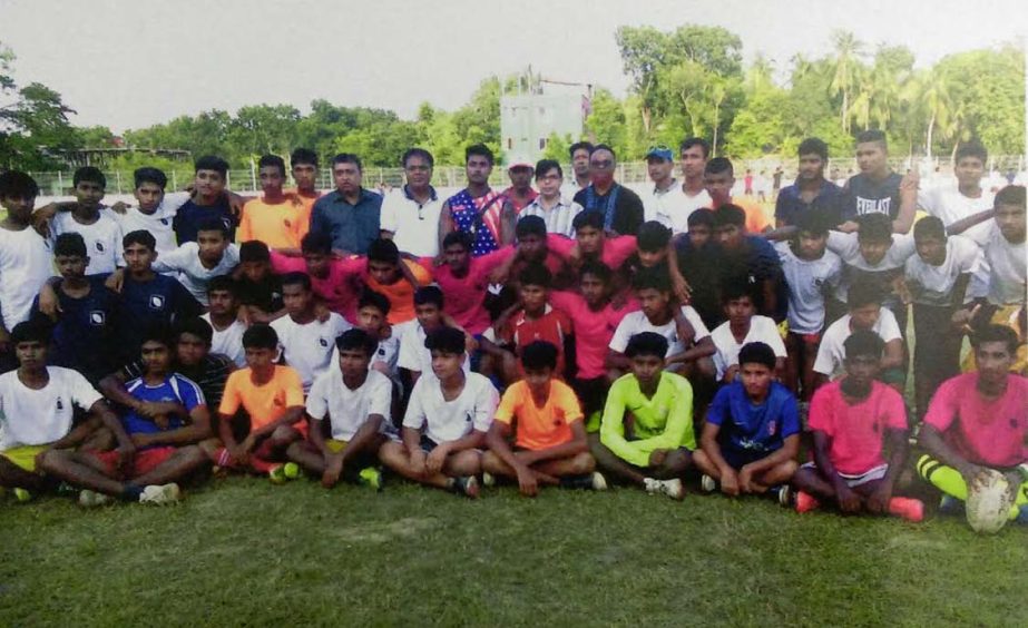 The selected under-16 rugby players with the officials of Narail District Sports Association and the instructors of National Sports Council pose for a photograph in Narail on Wednesday.