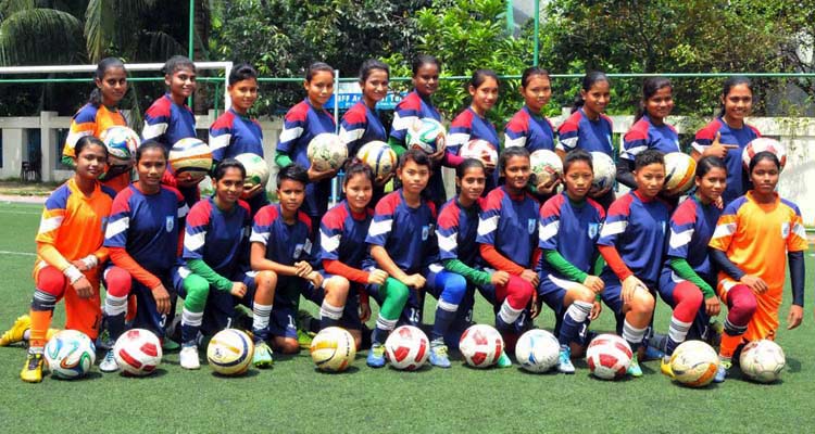 Members of Bangladesh National Under-16 Women's Football team pose for a photograph during their practice session at the BFF Artificial Turf on Wednesday.