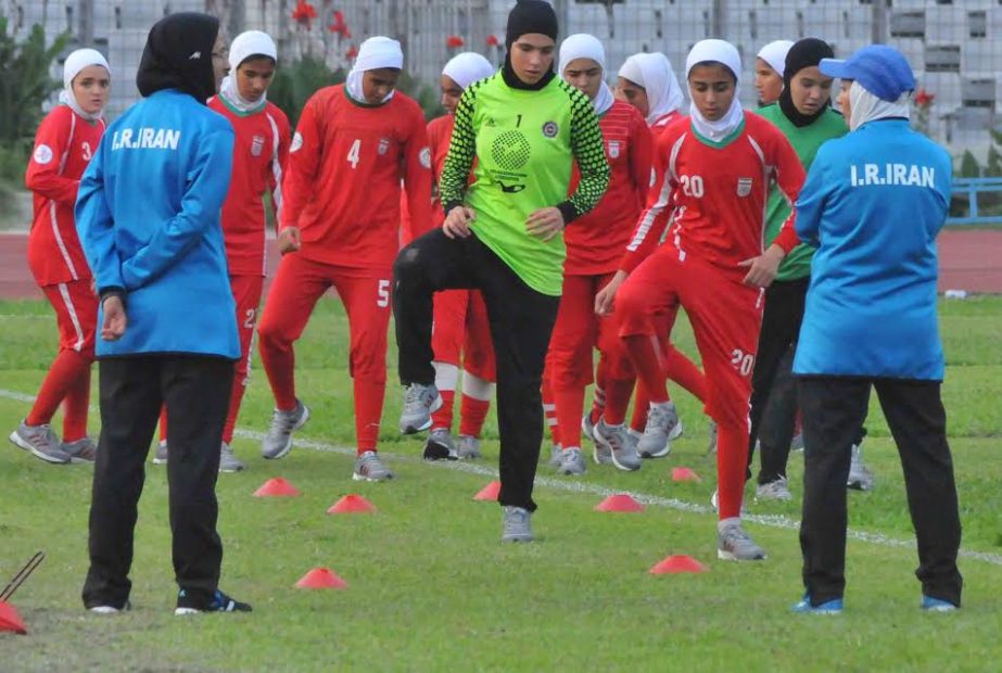 Members of Iran National Women's Under-16 Football team during their practice session at the Abahani Ground in Dhanmondi on Friday.
