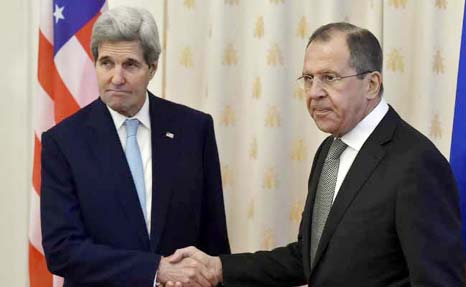 US Secretary of State John Kerry and Russian Foreign Minister Sergey Lavrov shaking hands after press conference in Geneva.