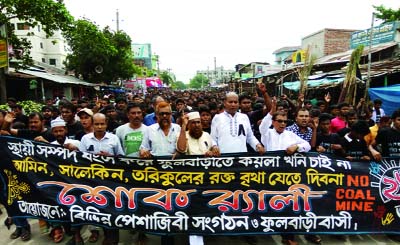 DINAJPUR (South): A mourning rally was brought out by different professional organisation to mark the Fulbari Day at Poura city on Friday.
