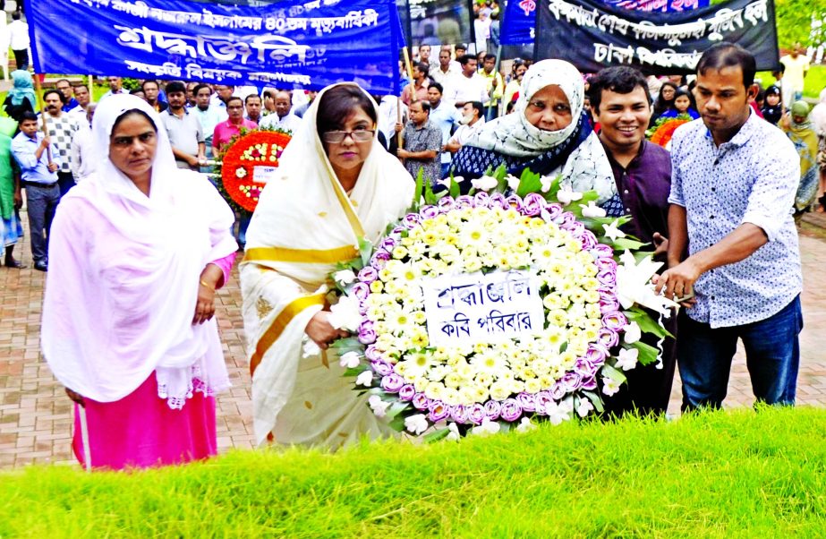 Family members of Poet Kazi Nazrul Islam placing wreaths at his mazar on Dhaka University campus marking the 40th death anniversary of the rebel poet on Saturday.