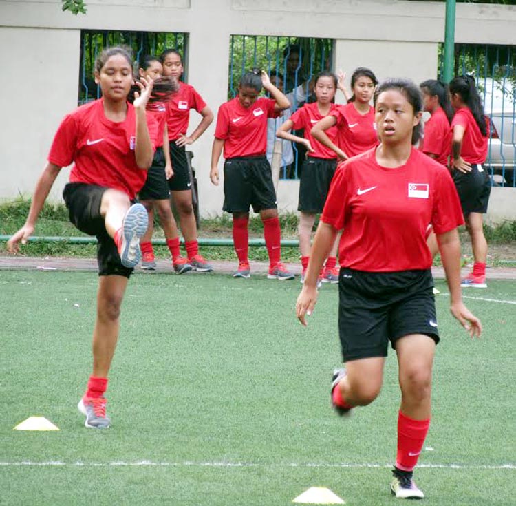 Members of Singapore National Women's Under-16 Football team taking part at their practice session at the BFF Artificial Turf on Sunday.