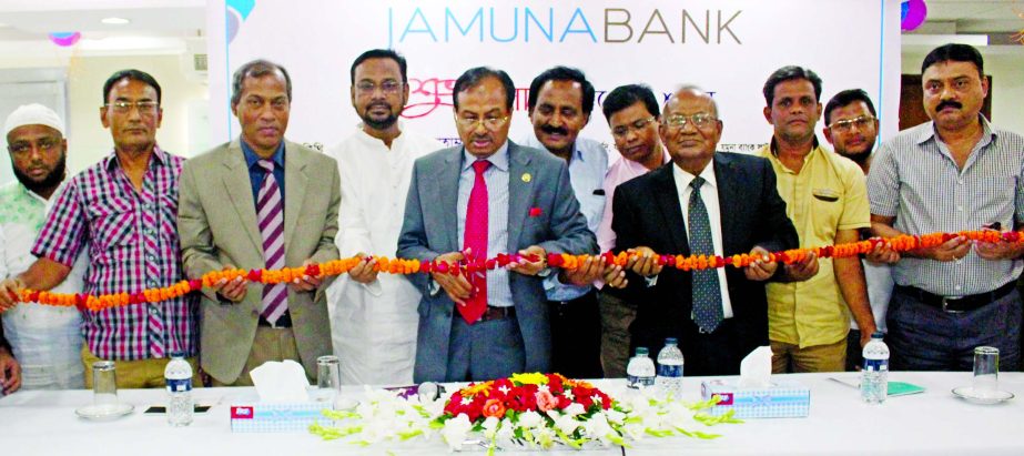 Nur Mohammed, Chairman, Executive Committee of Jamuna Bank Limited & Chairman, Jamuna Bank Foundation recently inaugurated the new premises of Jamuna Bank's Jessore Branch. Kanutosh Majumder Director and Ahmed Nawaz, Head of ICT of the bank along with l