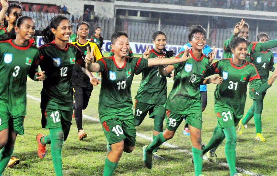 Players of Bangladesh U-16 Football team celebrate after winning the match against Singapore on Monday.