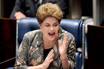 Suspended Brazilian President Dilma Rousseff answers questions during her impeachment trial at the National Congress in Brasilia on Monday.
