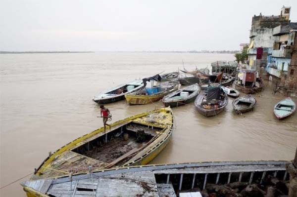 The holy city of Varanasi has been submerged by the swollen Ganges.