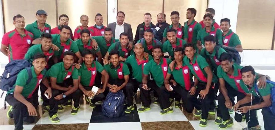 Members of Bangladesh National Football team pose for photo at the Hazrat Shahjalal International Airport on Tuesday.