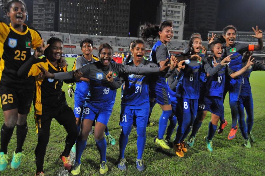 Players of Bangladesh U-16 football team celebrate after beating Kyrgyzstan in AFC U-16 Women's Championship-2017 Qualifiers at the Bangabandhu National Stadium on Wednesday.