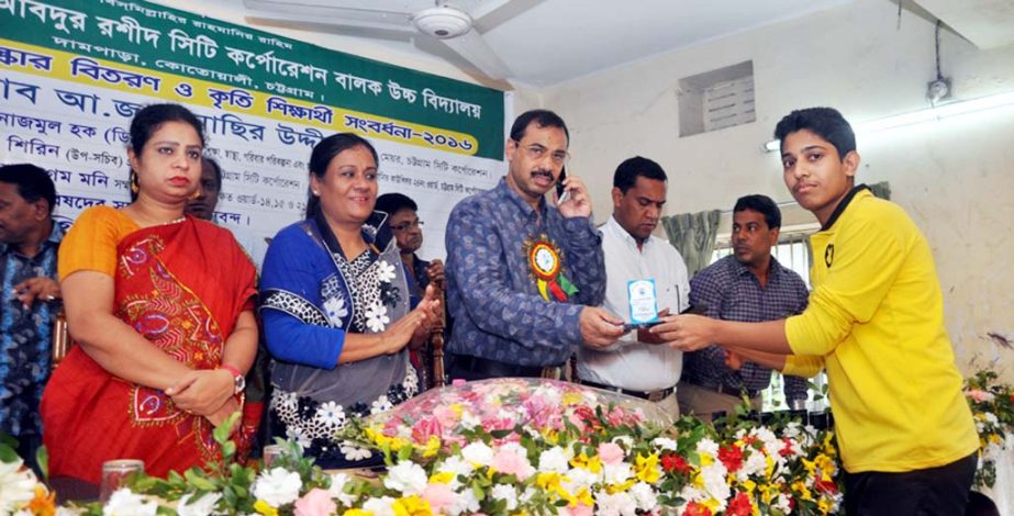 CCC Mayor A J M Nasir Uddin distributing prizes among the meritorious students of JSC, SSC and the winners of annual sports competition of Abdur Rashid Boys' High School as Chief Guest on Wednesday.