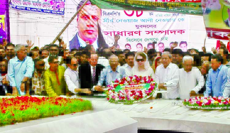 BNP Chairperson Begum Khaleda Zia along with party colleagues placing floral wreaths at the mazar of the party's founder Shaheed President Ziaur Rahman marking the party's 38th founding anniversary.