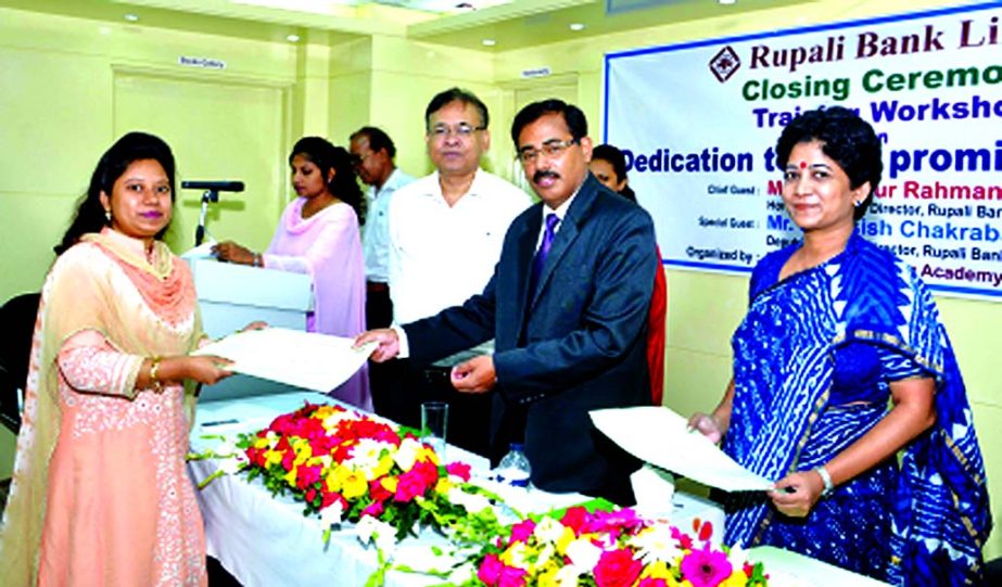 Training workshop on "Dedication to be a promising banker" held at Rupali Bank Training Academy in the city recently. Md. Ataur Rahman Prodhan, Managing Director, Md. Nazrul Islam General Manager and Salma Banu, DGM of Rupali Bank Ltd were present on th