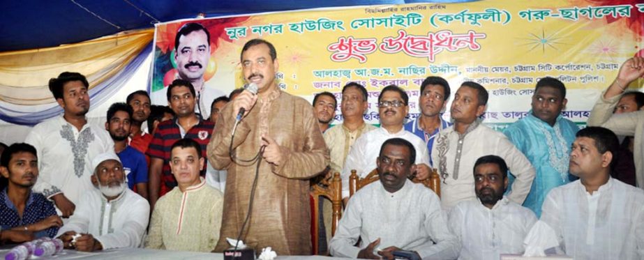 CCC Mayor A J M Nasir Uddin speaking at the inauguration programme of cattle market by Nur Nagar Housing Estate (Karnophuli) as Chief Guest on Friday.