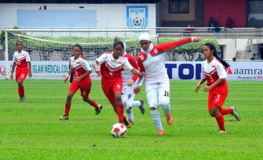 A moment of the match of the AFC Under-16 Women's Championship Qualifiers between Iran National Women's Under-16 Football team and Singapore National Women's Under-16 Football team at the Bangabandhu National Stadium on Saturday.