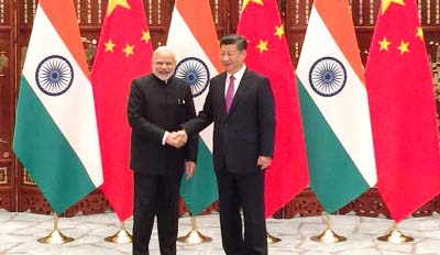 Chinese President Xi shaking hands with Indian Prime Minister Narendra Modi on the sidelines of the BRICS meet in China.