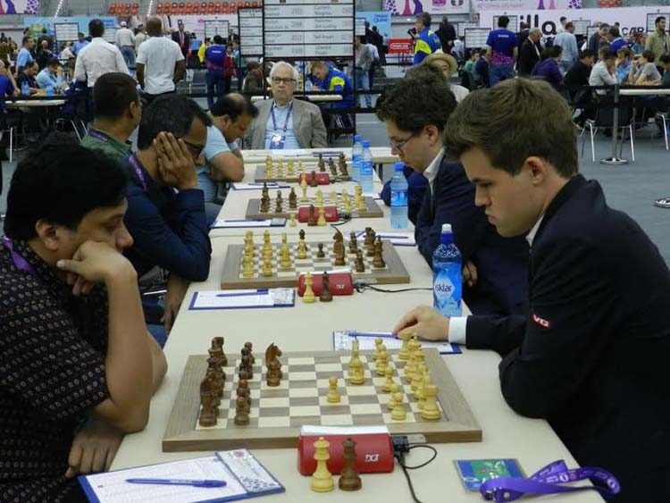 Bangladesh Chess team (left) playing against Norway Chess team in the Open Section of the 42nd World Chess Olympiad at Baku in Azerbaijan on Saturday.