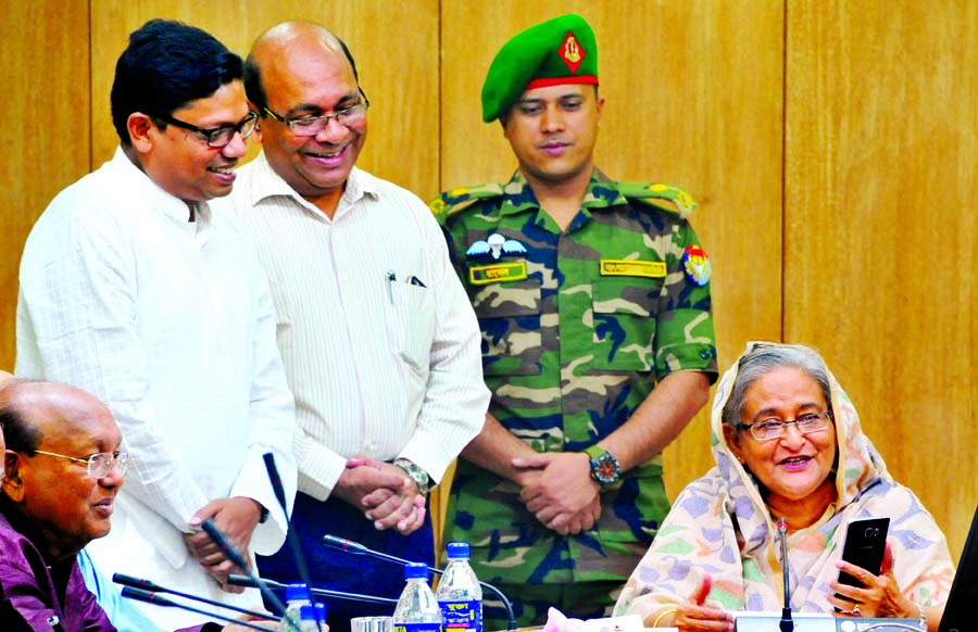 Prime Minister Sheikh Hasina inaugurating messaging app 'Alapon' for intercommunication between the government officials at Bangladesh Secretariat on Monday.
