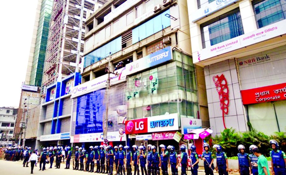 Law enforcers conducted a raid at China Building on Bir Uttam Mir Shaukat Ali Road in Gulshan-1 area in the city after receiving wrong information that a gang of militants have stormed the building on Tuesday morning.