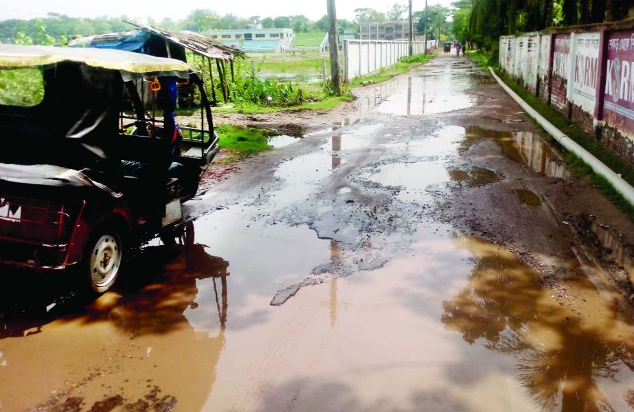 PATUAKHALI: The dilapidated road in front of Kalikapur Government Primary School at Ward No 94 needs immediate reconstruction . This picture was taken on Tuesday.