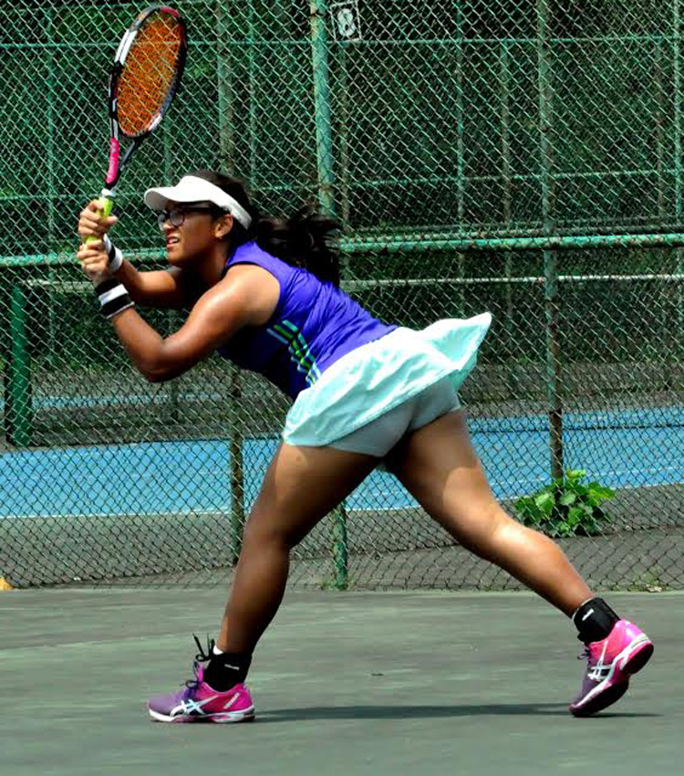 Afrana Islam Pritty of BKSP returns a ball to her opponent (not in the picture) during the women's singles match of the Walton 1st Open Tennis Tournament at the National Tennis Complex in Ramna on Wednesday.