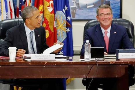 US President Barack Obama and Defence Secretary Ash Carter sit down to a meeting of the National Security Council at the Pentagon in Arlington, Virginia.