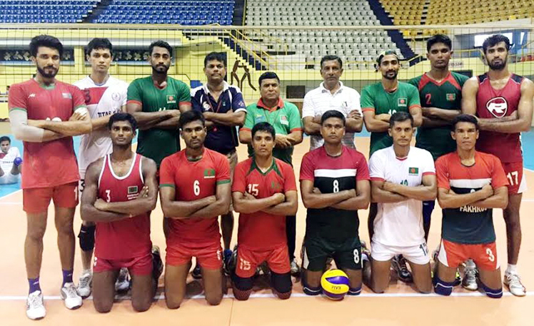 Members of Bangladesh National Volleyball team pose for a photo session at the Shaheed Suhrawardy Indoor Stadium in Mirpur on Thursday.