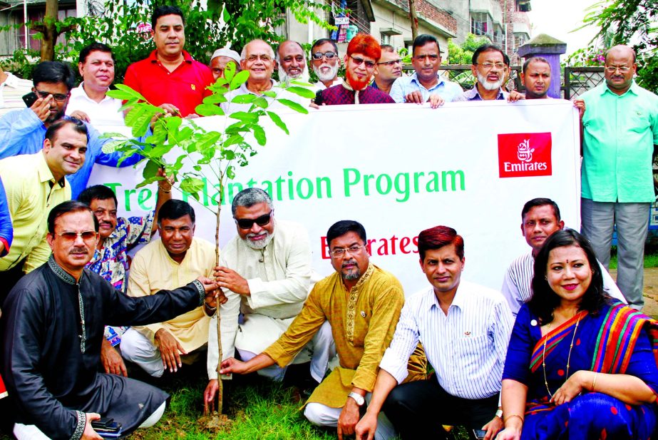 Khalid Ali J. Hassan, Emirates' Area Manager in Bangladesh, Mohammad Ayub, Governor Rotary International District 3281, Mohammed Hossain, President Welfare Society of Uttara Sector 14 and others are seen at a tree plantation program, jointly organised b