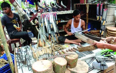 BOGRA: Blacksmiths in Gabtoli Upazila are passing busy time ahead of Eid -ul -Azah. This picture was taken yesterday.