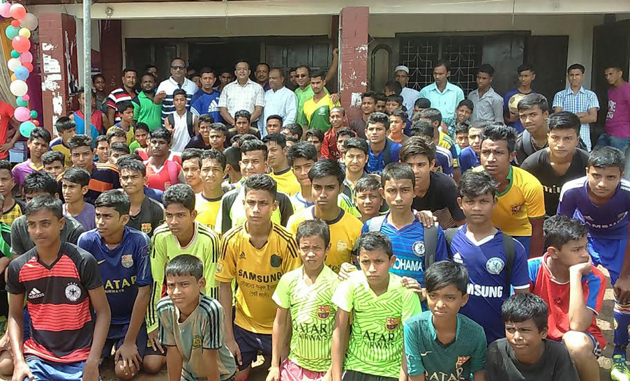 The selected under-15 footballers from grass-root level and the officials of Bangladesh Football Federation and the officials of Moulvibazar District Sports Association pose for photograph at Moulvibazar on Staturday.