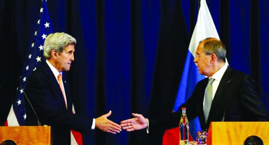 US Secretary of State John Kerry and Russian Foreign Minister Sergei Lavrov shake hands at the conclusion of their news conference following their meeting in Geneva, Switzerland where they discussed the crisis in Syria.